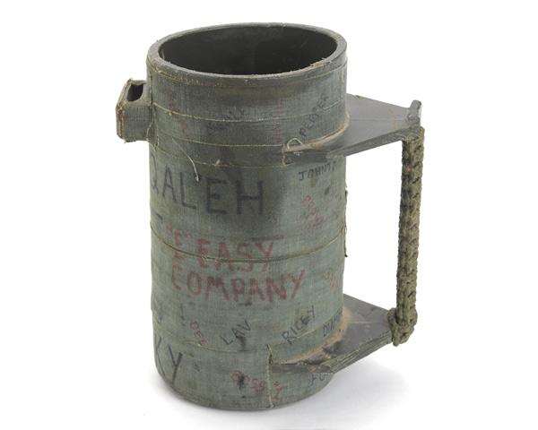 Mug made from a tube that carried 81mm mortar bombs, signed by members of Barossa Platoon, 1 Royal Irish Regiment, who served with 'Easy Company' in Musa Qala, 2006