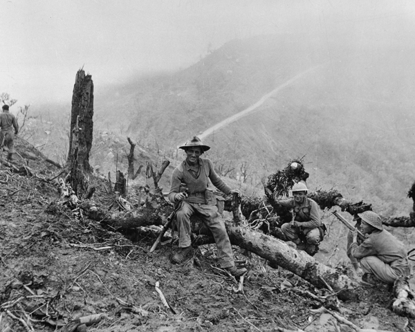 Members of the 10th Gurkha Rifles resting after the capture of 'Scraggy' hill, Imphal, 1944