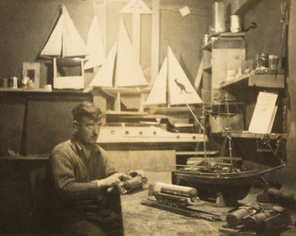 Sergeant Trimmer at work on one of his models at Stalag 383, c1943 