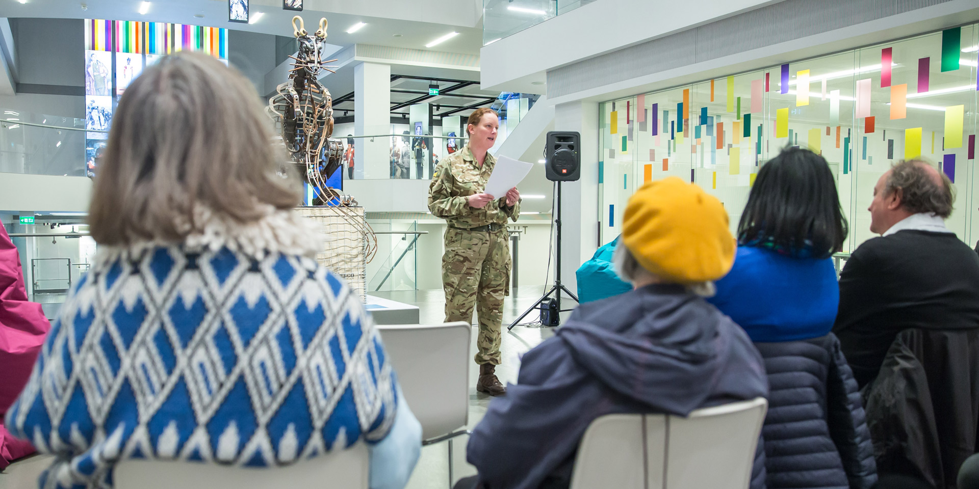 Woman soldier giving talk