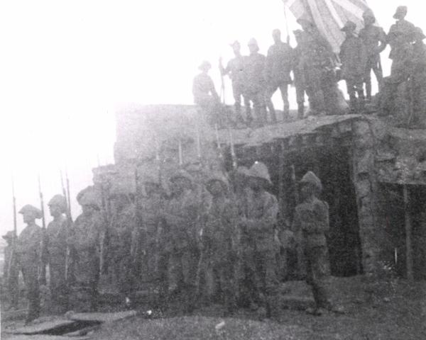 Members of 1st Battalion The Royal Fusiliers presenting arms, Tibet, 1904