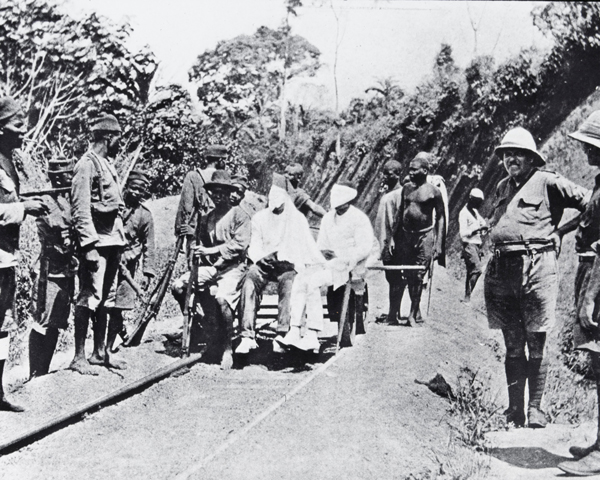 German colonial soldiers being brought into a British camp for parley, 1914