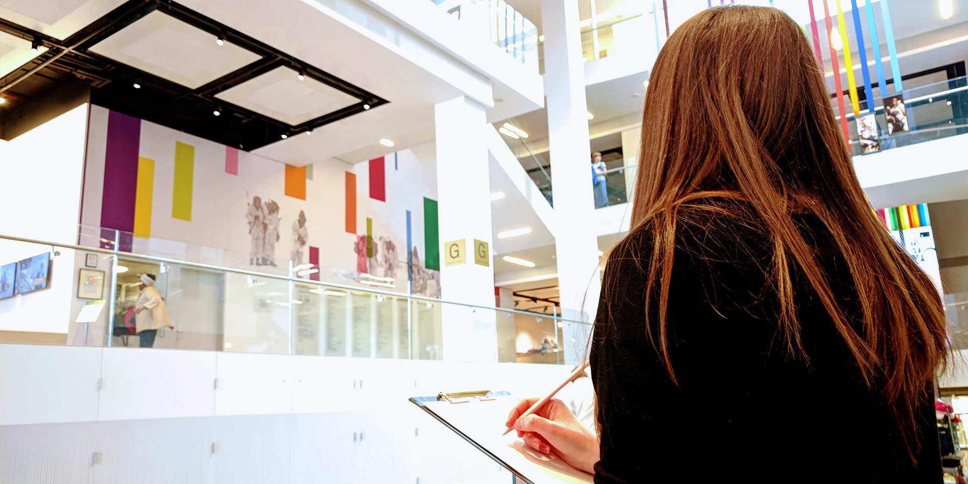 Visitor sketching museum