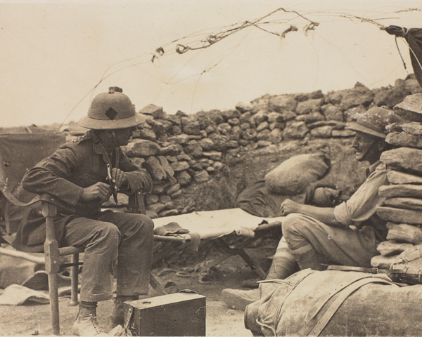 Two Dunsterforce officers sit in the ‘Mud Volcano’ position at Baku, September 1918