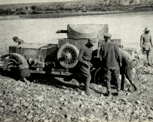 Digging out a Dunsterforce armoured car after a river crossing, 1918