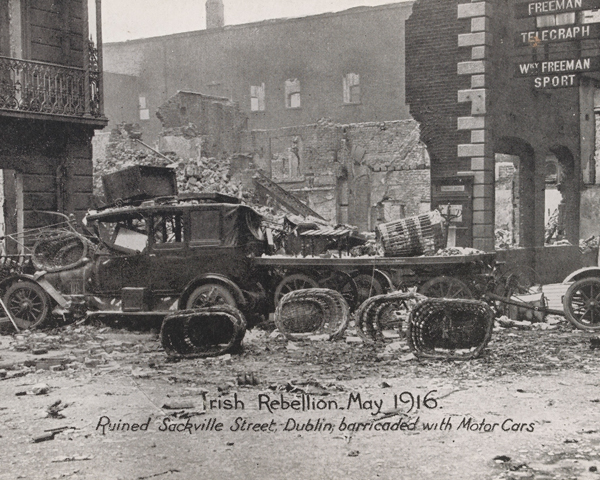 Sackville Street, Dublin, barricaded with motor cars, May 1916