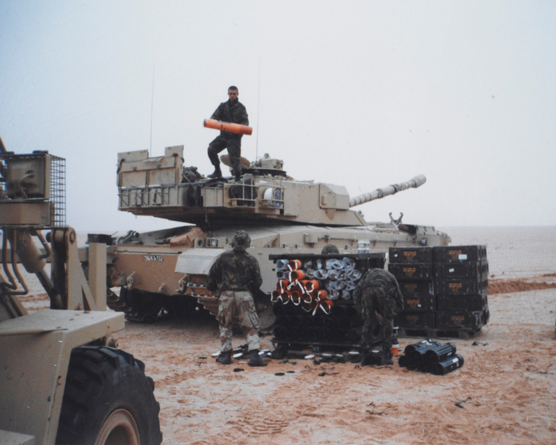 Re-arming a Challenger tank in the desert, 1991