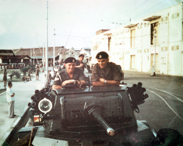 Members of 15th/19th Kings Royal Hussars aboard their Daimler armoured car, Malaya, 1957