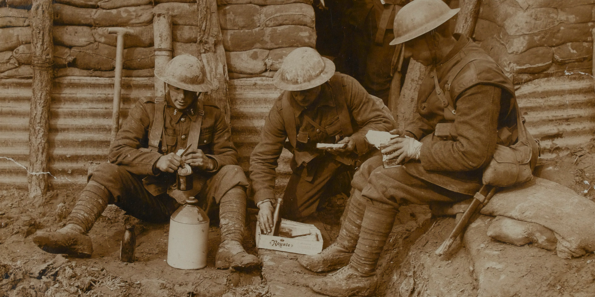 British soldiers eating in a trench, c1917