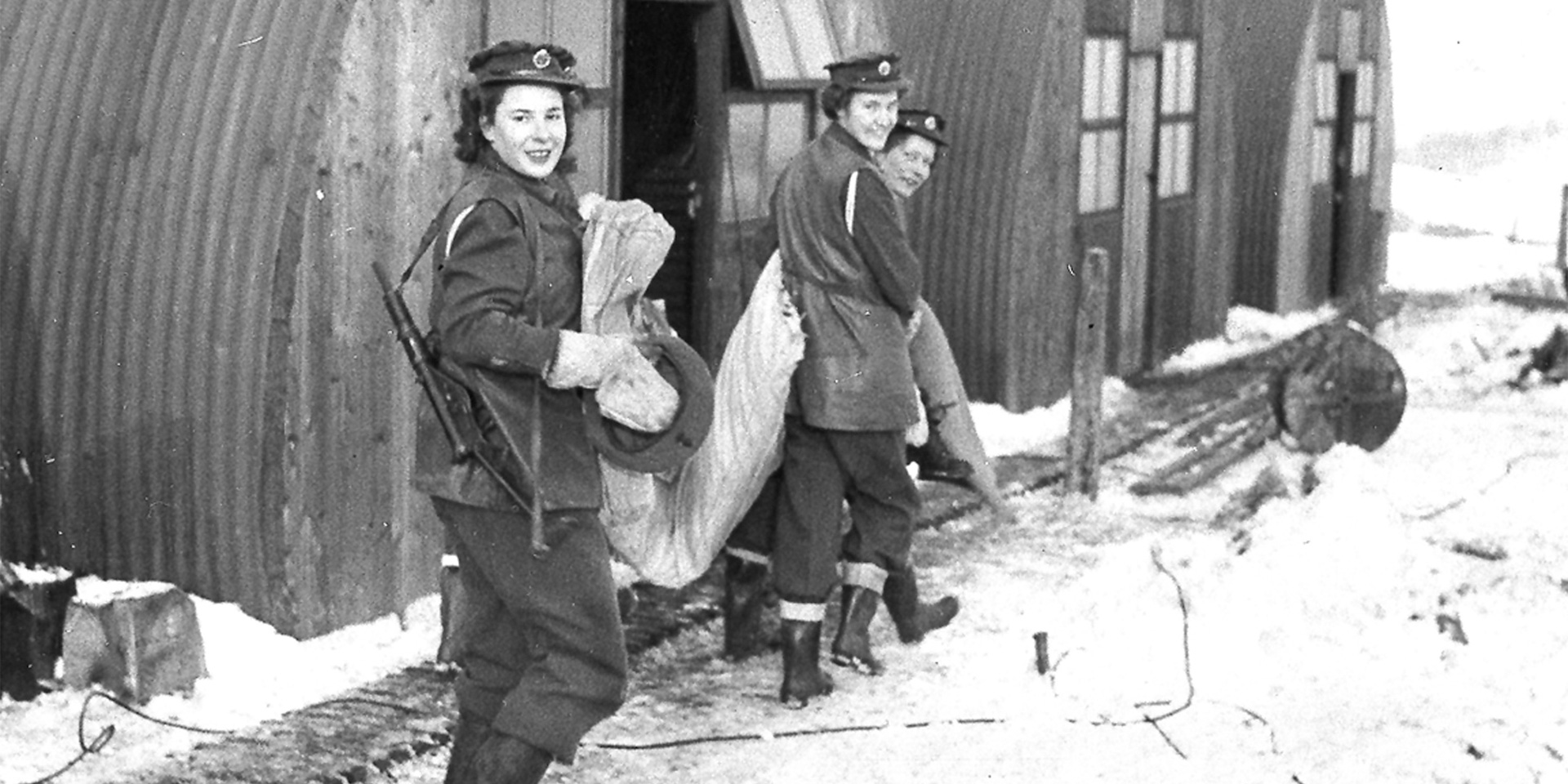 ATS women outside their Nissen huts, 1945