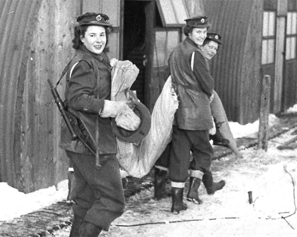 ATS women outside their Nissen huts, 1945