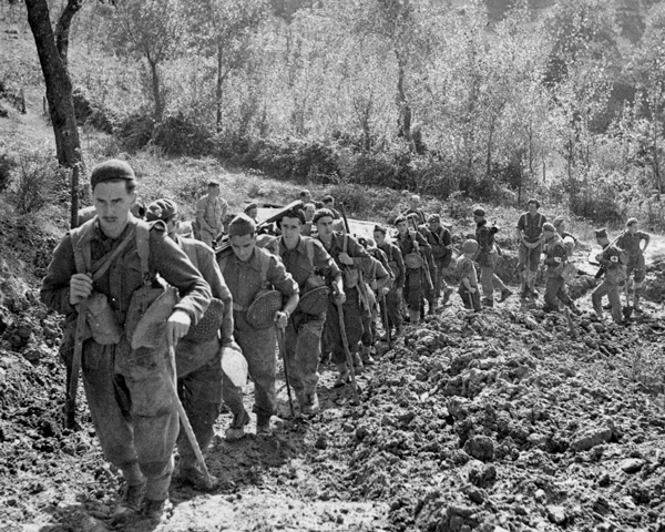 The 5th Grenadier Guards climb up to their forward positions near Anzio, 1944