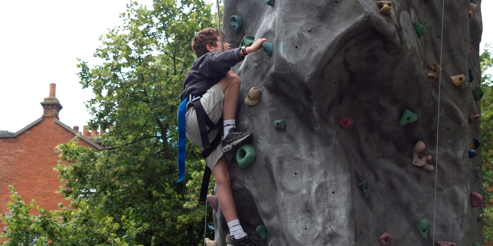 Child on a climbing wall