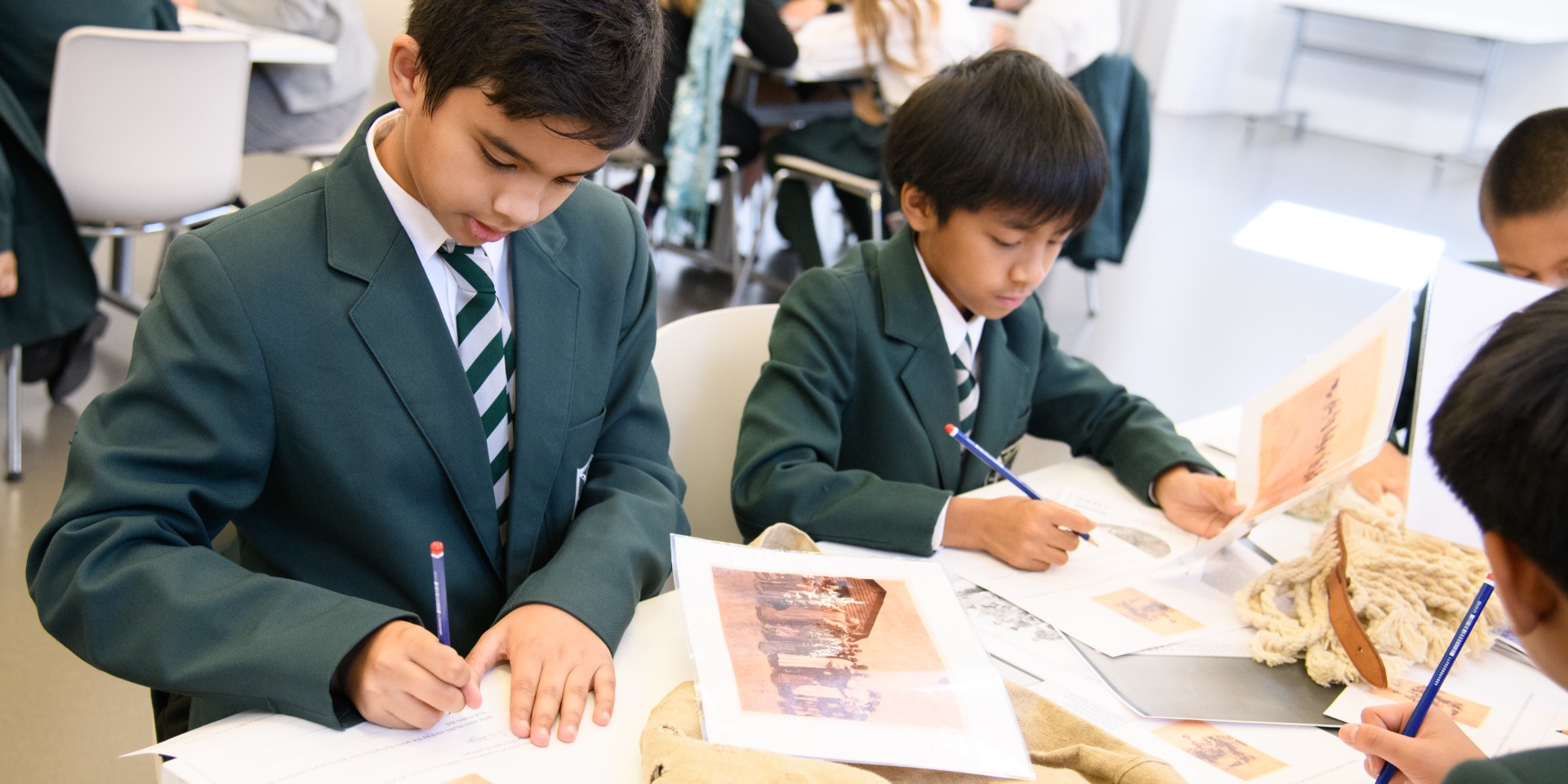 Schoolchildren working with our First World War archive