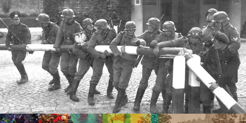 German soldiers breaking down the border gate at the start of their invasion of Poland, 1 September 1939
