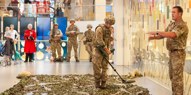 Royal Engineers demonstrating bomb search and disposal