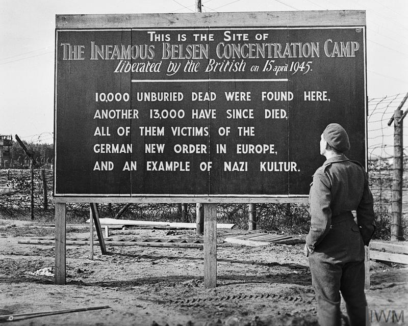 A sign erected by British at Belsen's entrance, May 1945