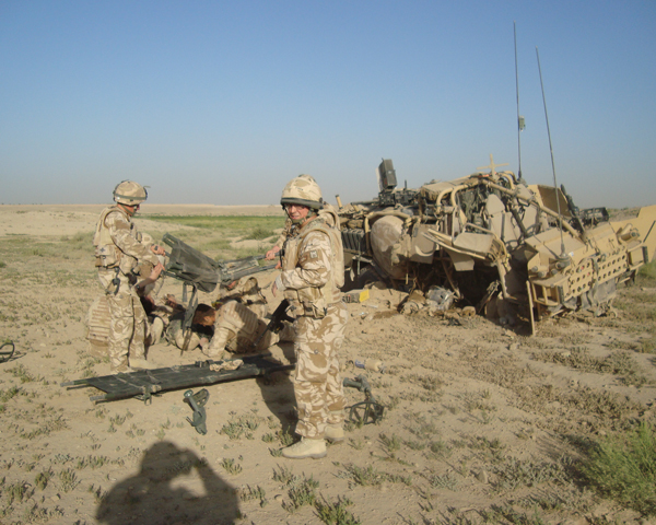 Treating wounded soldiers after an IED damaged their vehicle, 2007