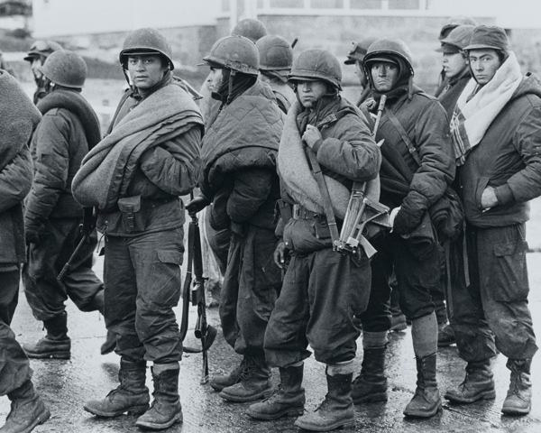 Argentine soldiers waiting to surrender their weapons at Port Stanley after the capitulation, 1982