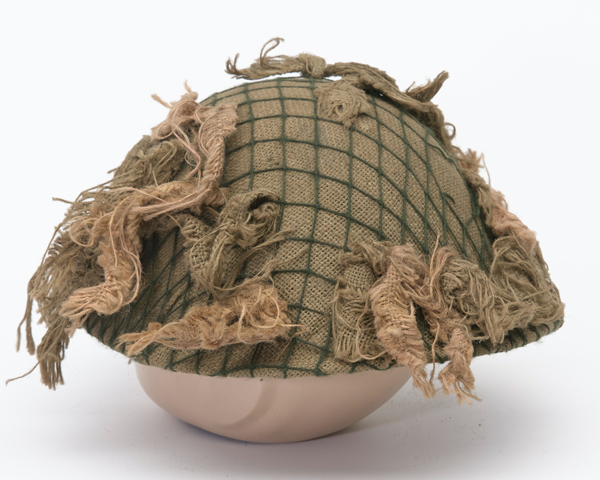 Helmet worn by a Scots Guardsmen in the Falklands, 1982