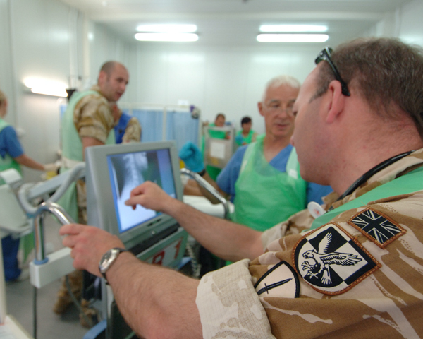 Checking a patient's x-rays at Camp Bastion Hospital, 2008