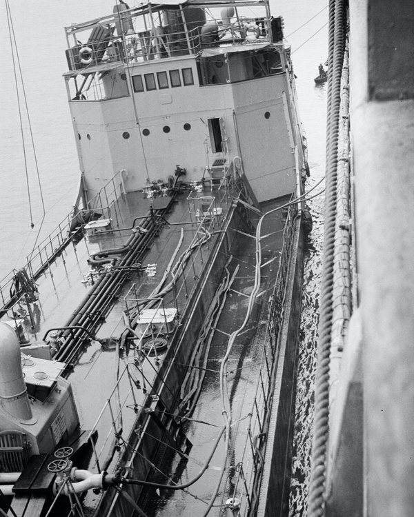 A tanker refuelling HMT 'Orion', 1941