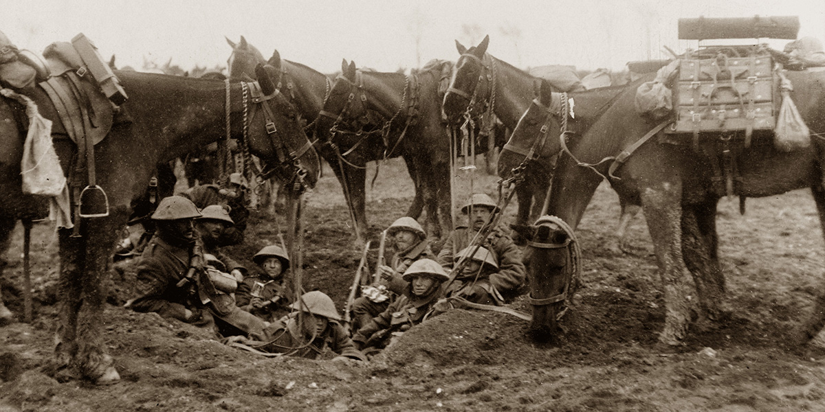 Cavalrymen resting in a shell hole during the Battle of the Scarpe, April 1917