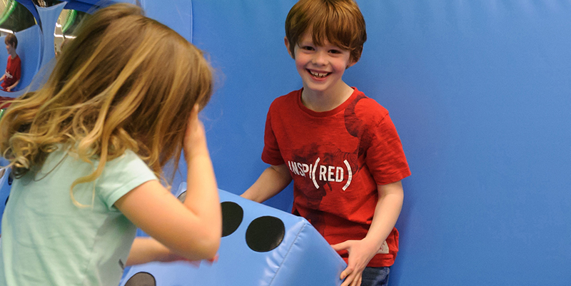 Children attending a giant games workshop