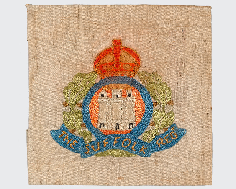 Badge of the Suffolk Regiment embroidered by a convalescing soldier, c1918