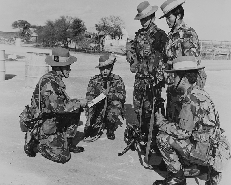 Gurkhas being briefed before moving out on patrol at the British Sovereign Base of Dhekelia, 1974