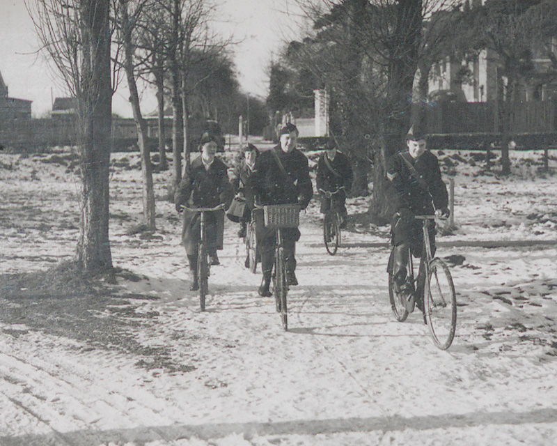 ATS personnel riding bikes in the snow, Shoeburyness, February 1941
