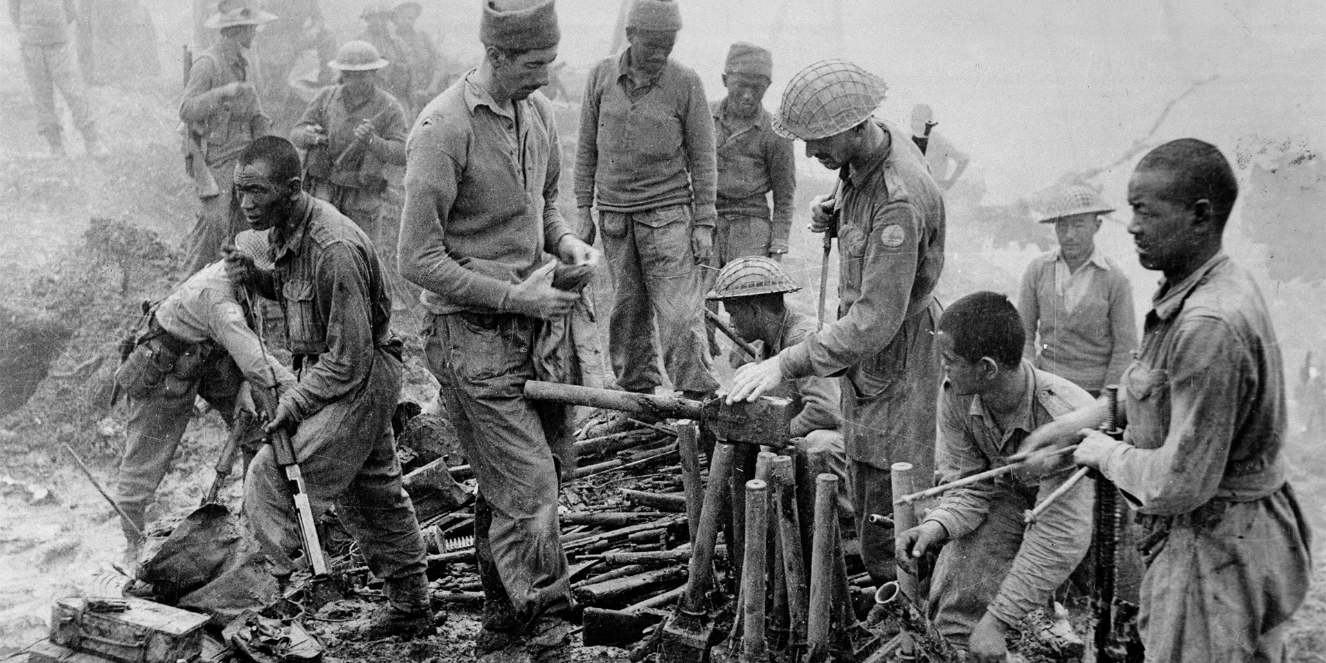Indian and Gurkha soldiers inspect captured Japanese ordnance, Burma campaign, 1944