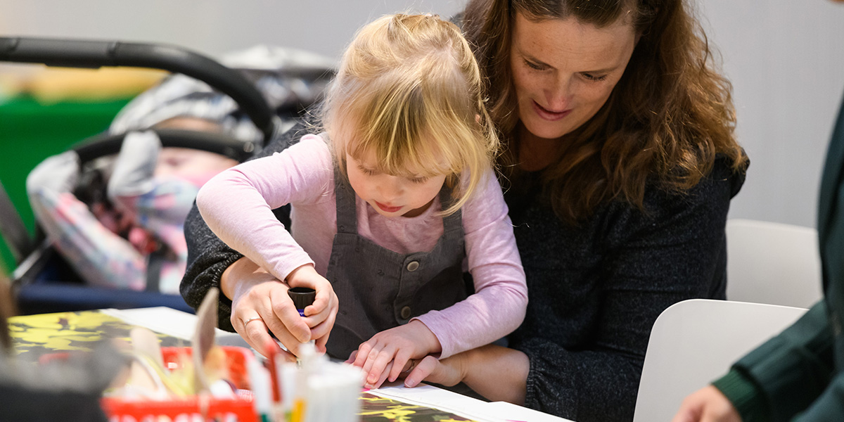 Child attending an arts and crafts workshop