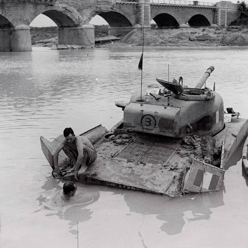 A tank bogged down in a river in Italy, 1943