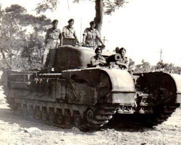 Chester and his crew on their tank, 'Ballyrashane', 1944