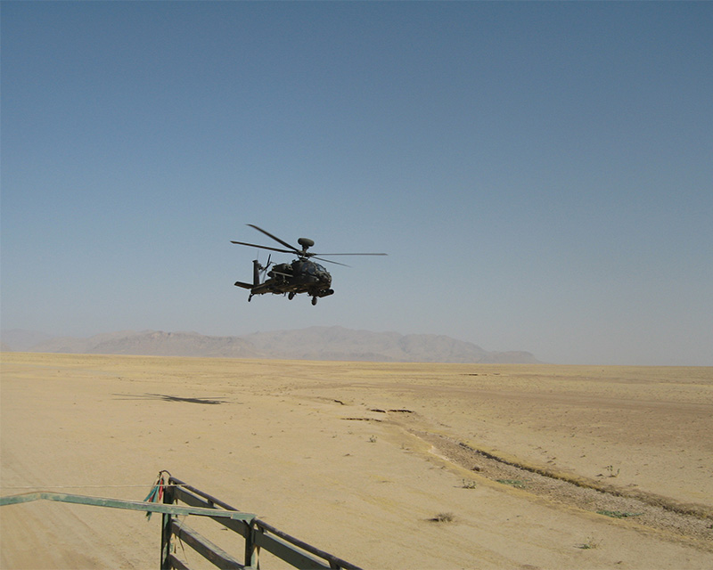 Apache helicopter photographed from the back of a civilian ‘jingly wagon’ during the extraction from Musa Qala, October 2006
