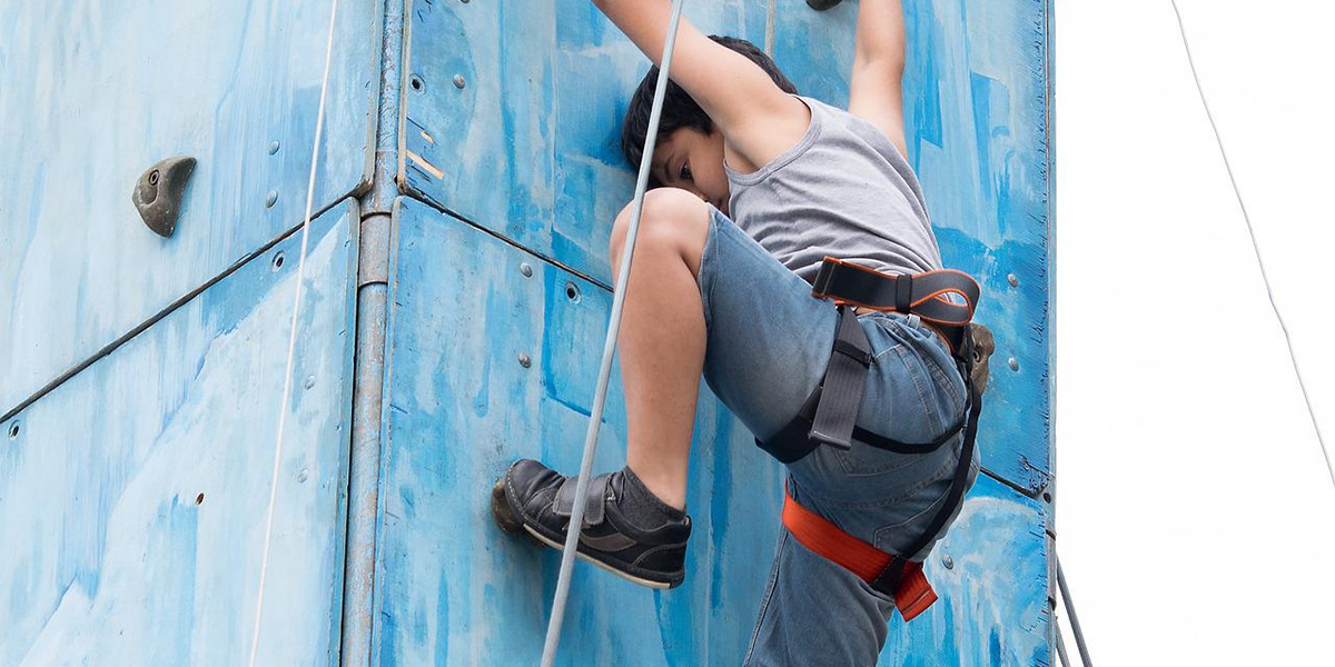 Child on a climbing wall