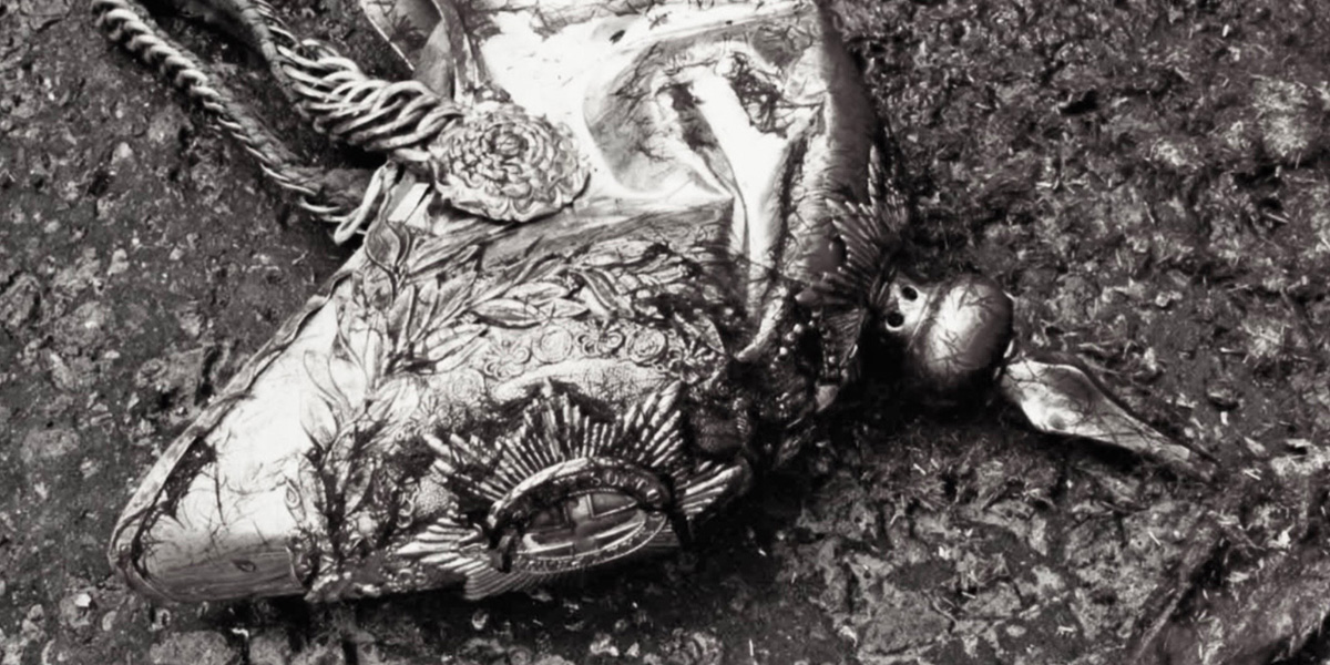 A bomb-scarred Household Cavalry helmet