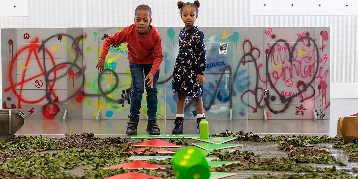 Children attending a giant game workshop