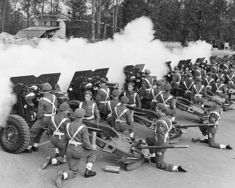 A salute by 25-pounder guns of 3rd Royal Horse Artillery at the British Victory Parade, Berlin, 21 July 1945