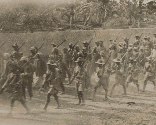 7th Gurkha Rifles escorting Turkish prisoners captured at the Battle of Shaiba, 1915
