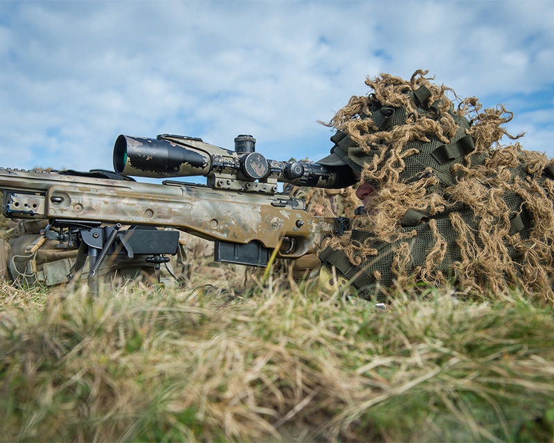 Sniper from The Royal Regiment of Fusiliers takes aim during training, Wiltshire, 2017