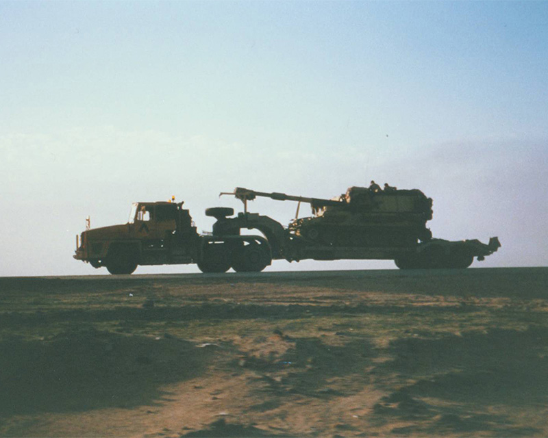 RCT vehicle moving a M109 gun in the Gulf, 1991