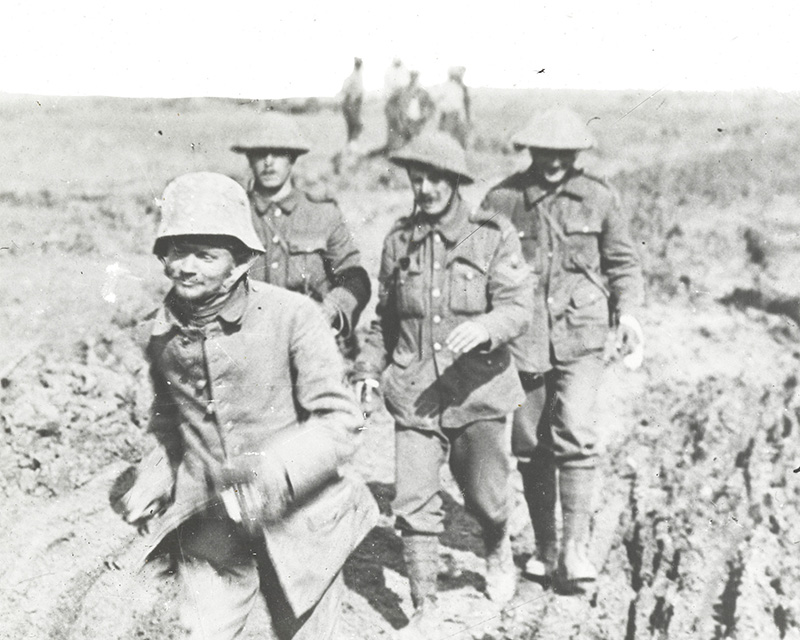 German prisoner escorted by Grenadier Guardsmen near Ginchy, 25 September 1916