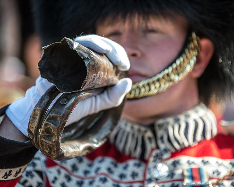 A drummer from The Grenadier Guards holds a bugle recovered from the field of Waterloo at a ceremony to mark the 200th anniversary of the battle, 2015