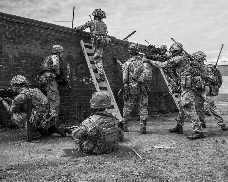 Soldiers of 2nd Battalion, The Royal Anglian Regiment conducting compound clearance drills, Lydd Ranges, 2017