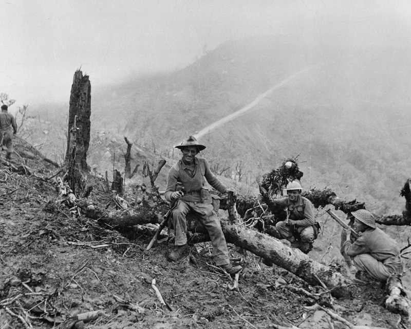 Men of 10th Gurkha Rifles resting after the capture of 'Scraggy' hill, Burma, 1944