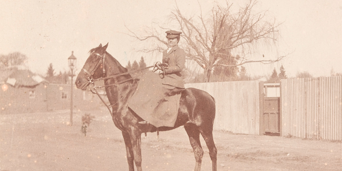 A member of the First Aid Nursing Yeomanry on horseback, c1910