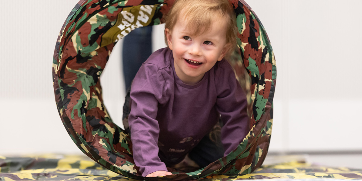 Toddler playing at a Tiny Troopers session