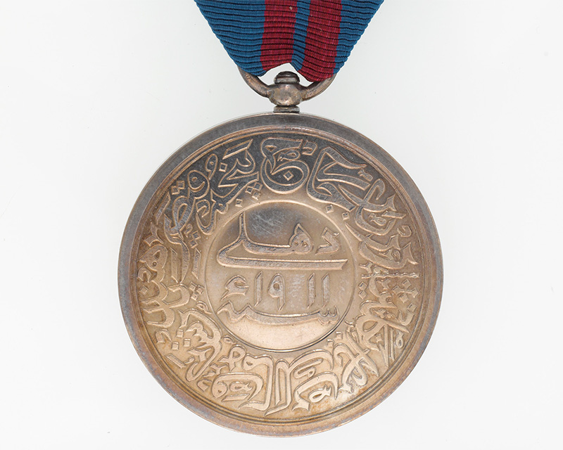 Persian inscription on Delhi Durbar Medal 1911